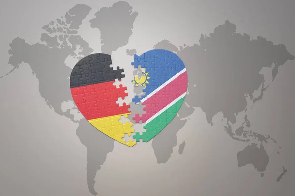 在世界地图的背景上 将德国国旗与南非国旗拼凑在一起 3D插图 — 图库照片