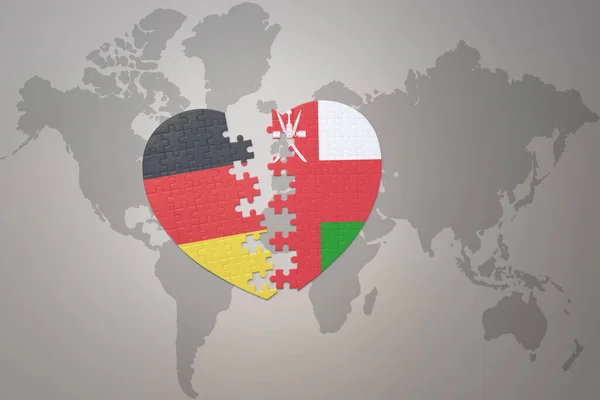 世界地図の背景にドイツとドイツの国旗が描かれたパズルハートです コンセプト 3Dイラスト — ストック写真