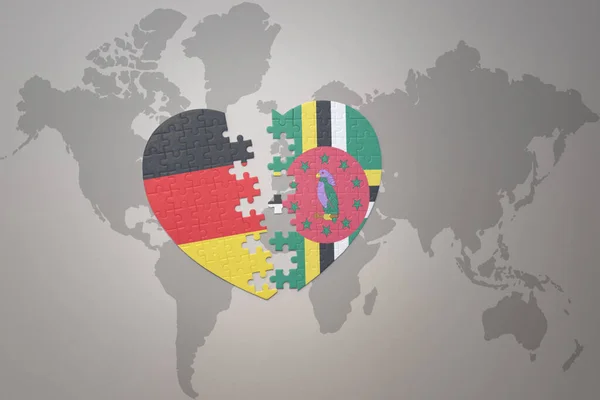 Puzzle Srdce Národní Vlajkou Dominiky Německo Pozadí Mapy Světa Koncept — Stock fotografie