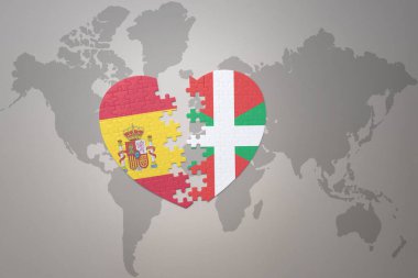 Bask ülkesinin ulusal bayrağı ve dünya haritasının arka planında İspanya 'nın yapboz kalbi. Kavram. 3B illüstrasyon