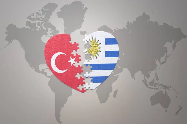 Puzzle Srdce Národní Vlajkou Krocana Uruguay Pozadí Mapy Světa Koncept — Stock fotografie