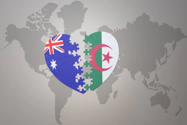 世界地図の背景にアルジェリアとオーストラリアの国旗が描かれたパズルハートです コンセプト 3Dイラスト — ストック写真