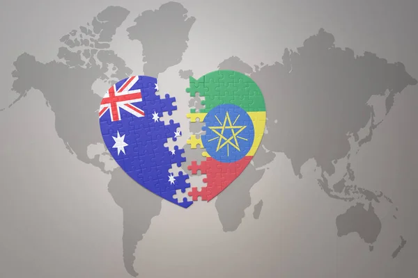 世界地図の背景にエチオピアとオーストラリアの国旗が描かれたパズルハートです コンセプト 3Dイラスト — ストック写真