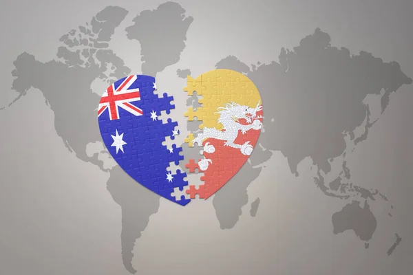 世界地図の背景にブータンとオーストラリアの国旗が描かれたパズルハートです コンセプト 3Dイラスト — ストック写真