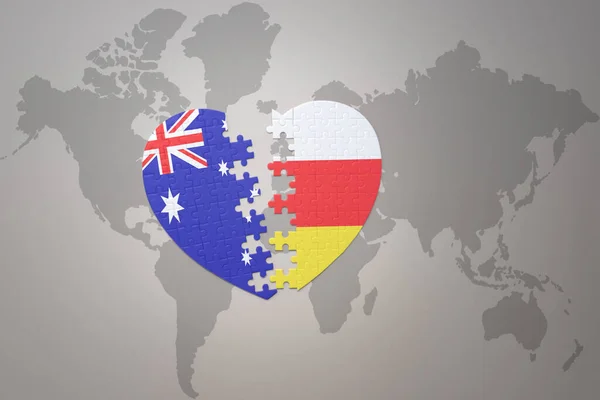 世界地図の背景に南オセチアとオーストラリアの国旗が描かれたパズルハートです コンセプト 3Dイラスト — ストック写真