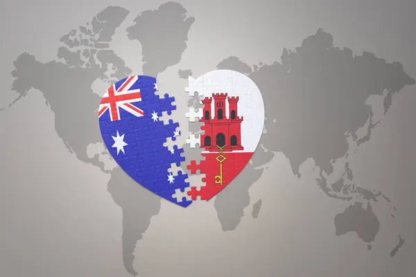 世界地図の背景にジブラルタルとオーストラリアの国旗が描かれたパズルハートです コンセプト 3Dイラスト — ストック写真