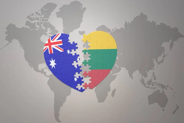 リトアニアとオーストラリアの国旗が描かれたパズルハートが世界地図の背景にあります コンセプト 3Dイラスト — ストック写真