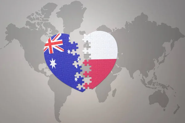 世界地図の背景にポーランドとオーストラリアの国旗が描かれたパズルハートです コンセプト 3Dイラスト — ストック写真