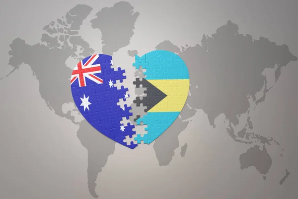 世界地図の背景にバハマとオーストラリアの国旗が描かれたパズルハートです コンセプト 3Dイラスト — ストック写真