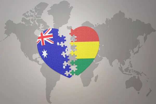 世界地図の背景にボリビアとオーストラリアの国旗が描かれたパズルハートです コンセプト 3Dイラスト — ストック写真
