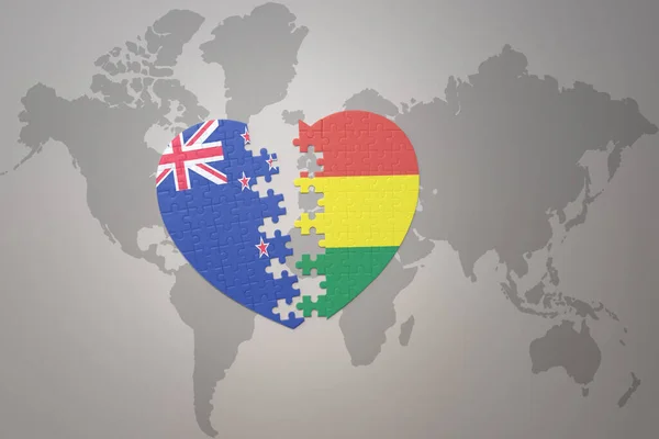 世界地図の背景にニュージーランドとボリビアの国旗が描かれたパズルハートです コンセプト 3Dイラスト — ストック写真