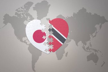 Japonya, Trinidad ve Tobago 'nun ulusal bayrağını taşıyan bir bulmaca kalbi dünya haritası arka planında. Kavram. 3B illüstrasyon