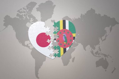 Japonya ve Dominica 'nın ulusal bayrağını taşıyan yapboz kalbi dünya haritasının arka planında. Kavram. 3B illüstrasyon