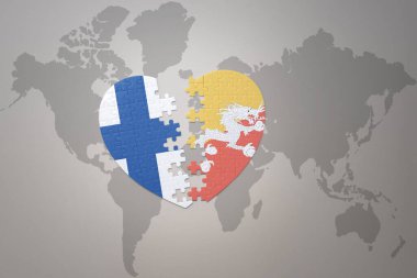 Dünya haritasının arka planında Butan ve Finlandiya 'nın ulusal bayrağını taşıyan bir bulmaca kalbi. Kavram. 3B illüstrasyon