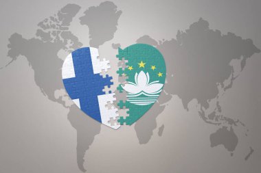 Macau ve Finlandiya 'nın ulusal bayrağını içeren bir yapboz kalbi dünya haritasının arka planında. Kavram. 3B illüstrasyon