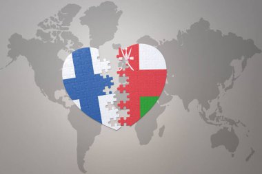 Umman ve Finlandiya 'nın ulusal bayrağını taşıyan bir yapboz kalbi dünya haritasında. Kavram. 3B illüstrasyon