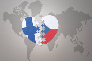 Dünya haritasının arka planında, Czech Cumhuriyeti ve Finlandiya 'nın ulusal bayrağını taşıyan bir bulmaca kalbi. Kavram. 3B illüstrasyon