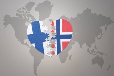 Norveç ve Finlandiya 'nın ulusal bayrağını içeren yapboz kalp dünya haritası arka planında. Kavram. 3B illüstrasyon