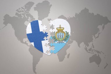 San Marino ve Finlandiya 'nın ulusal bayrağını taşıyan bir yapboz kalbi dünya haritasının arka planında. Kavram. 3B illüstrasyon