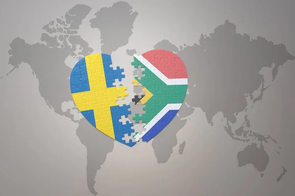 パズルハートで世界地図の背景にスウェーデンと南アフリカの国旗が描かれています コンセプト 3Dイラスト — ストック写真