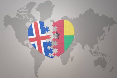 Dünya haritasının arka planında Gine Bissau ve İzlanda 'nın ulusal bayrağını taşıyan yapboz kalp. Kavram. 3B illüstrasyon
