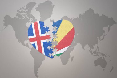Dünya haritasının arka planında Seyşeller ve İzlanda 'nın ulusal bayrağı olan bir yapboz kalbi. Kavram. 3B illüstrasyon