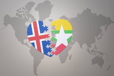 Dünya haritasının arka planında Myanmar ve İzlanda 'nın ulusal bayrağı olan bir yapboz kalbi. Kavram. 3B illüstrasyon