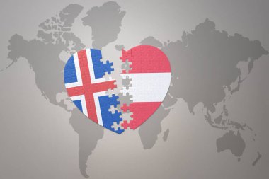 Avustralya ve İzlanda 'nın ulusal bayrağını taşıyan bir yapboz kalbi dünya haritasının arka planında. Kavram. 3B illüstrasyon