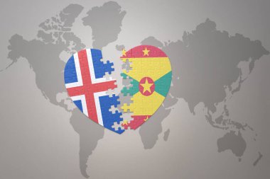 Dünya haritasının arka planında Grenada ve İzlanda 'nın ulusal bayrağı olan bir yapboz kalp. Kavram. 3B illüstrasyon