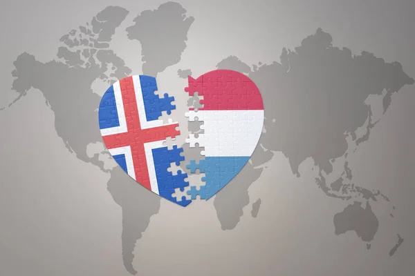 Puzzle Heart National Flag Luxembourg Iceland World Map Background Concept — Stock Photo, Image