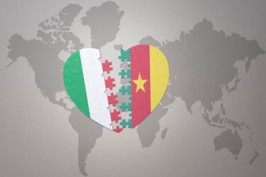 Kamerun ve İtalya 'nın ulusal bayrağıyla bir dünya haritasında bulmaca kalbi. 3B illüstrasyon