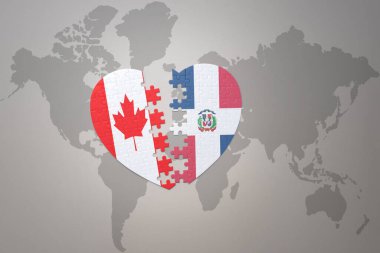 Kanada ve Dominik Cumhuriyeti 'nin ulusal bayrağını bir dünya haritasında bulmaca kalbi. Konsept. 3B illüstrasyon