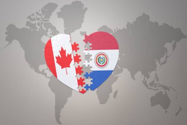 Kanada ve Paraguay 'ın ulusal bayrağıyla bir dünya haritasında bulmaca kalbi. 3B illüstrasyon