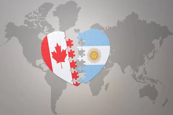 Puzzle Srdce Národní Vlajkou Kanady Argentiny Pozadí Světové Mapové Koncepce — Stock fotografie