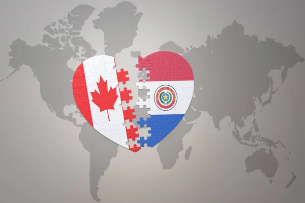 Puzzle Srdce Národní Vlajkou Kanady Paraguaye Pozadí Světové Mapy Concept — Stock fotografie