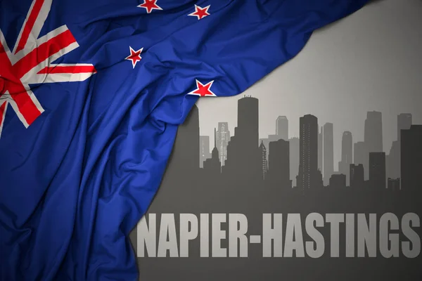 Abstract Silhouette City Text Napier Hastings Waving Colorful National Flag — Stock Photo, Image