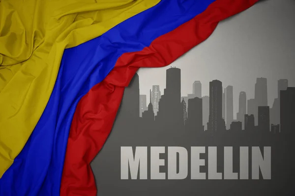 Silueta Abstracta Ciudad Con Texto Medellín Cerca Ondeando Colorida Bandera — Foto de Stock