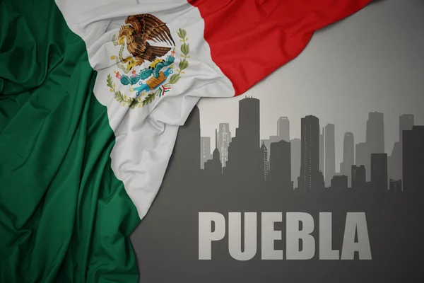 テキストのある街の抽象的なシルエットプエブラは 灰色の背景にメキシコのカラフルな国旗を振って近く — ストック写真