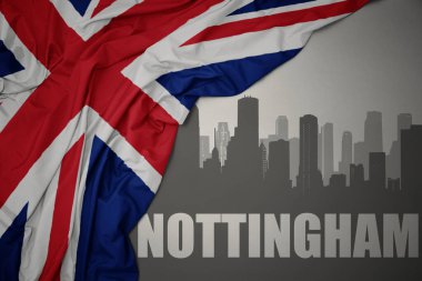Şehrin soyut silueti. Nottingham, gri bir arkaplanda büyük Britanya bayrağının dalgalanmasının yanında yazılı..