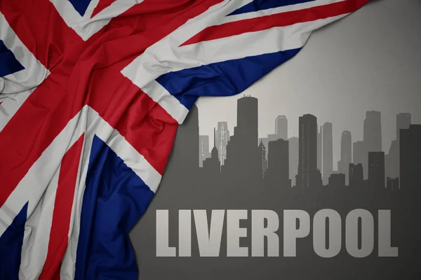 Abstrakcyjna Sylwetka Miasta Tekstem Liverpool Pobliżu Machania Kolorowe Flagi Narodowej — Zdjęcie stockowe