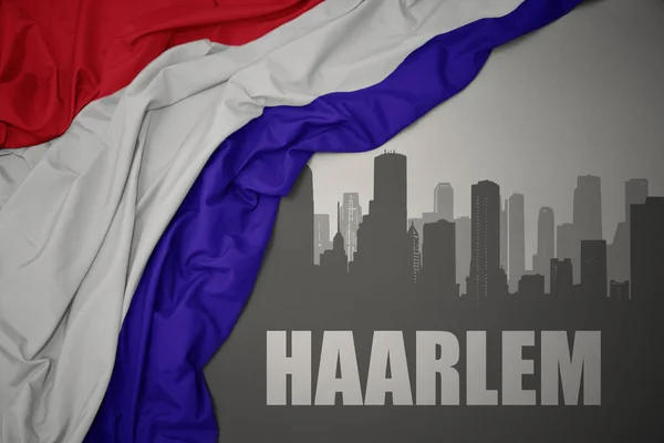 Abstraktní Silueta Města Textem Haarlem Blízkosti Vlnění Barevné Národní Vlajky — Stock fotografie