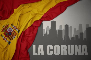 Şehrin soyut silueti. Üzerinde La Coruna yazıları var. Gri bir arkaplanda İspanya 'nın renkli bayrağını sallıyor..
