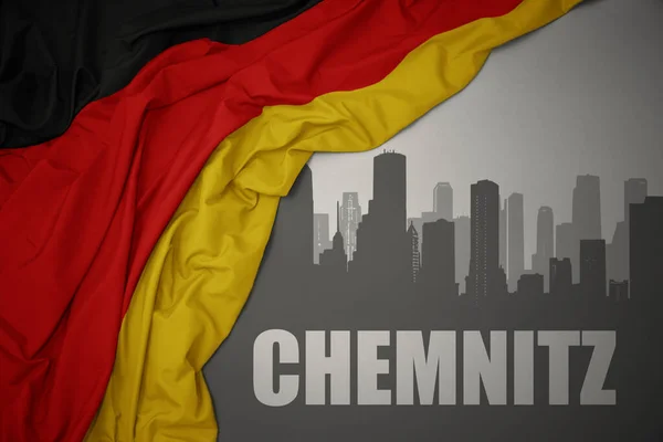 Silhueta Abstrata Cidade Com Texto Chemnitz Perto Acenando Colorido Bandeira — Fotografia de Stock