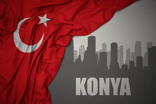 Silhueta Abstrata Cidade Com Texto Konya Perto Acenar Bandeira Nacional — Fotografia de Stock
