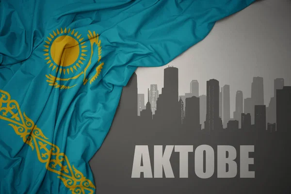 Gri Arkaplanda Kazakistan Renkli Ulusal Bayrağını Dalgalandıran Aktobe Ait Yazı — Stok fotoğraf