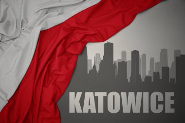 Şehrin soyut silueti. Gri bir arka planda renkli Polonya bayrağı dalgalanması yakınlarındaki Katowice yazıları..