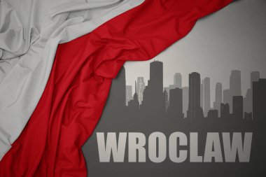 Şehrin soyut silueti. Gri arkaplanda renkli bir Polonya bayrağı dalgalandıran Wroclaw yazısıyla birlikte..