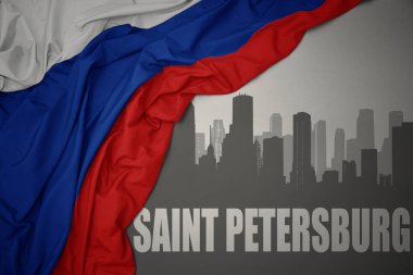 Şehrin soyut silueti, gri bir arka planda Rusya 'nın renkli bayrağının dalgalandığı Saint Petersburg yazısıyla..