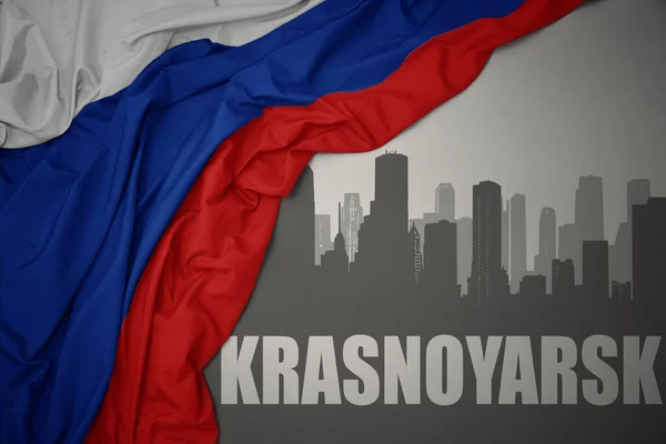 Silueta Abstracta Ciudad Con Texto Krasnoyarsk Cerca Ondeando Colorida Bandera —  Fotos de Stock