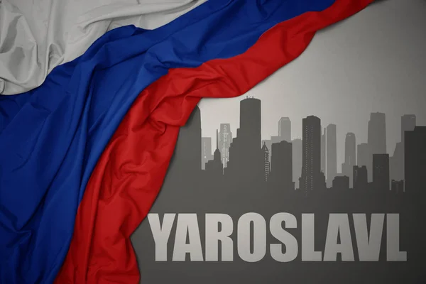 Silueta Abstracta Ciudad Con Texto Yaroslavl Cerca Ondeando Colorida Bandera —  Fotos de Stock